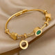 Gold Emerald Charm Bracelet