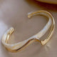 White opal elegant golden bracelet