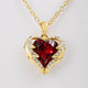 Angel Embrace Ruby Heart Gold Necklace